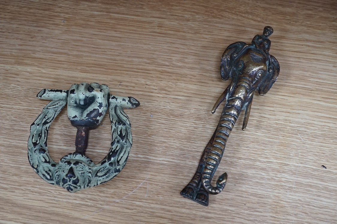 A group of four various cast brass door knockers. Condition- fair to good